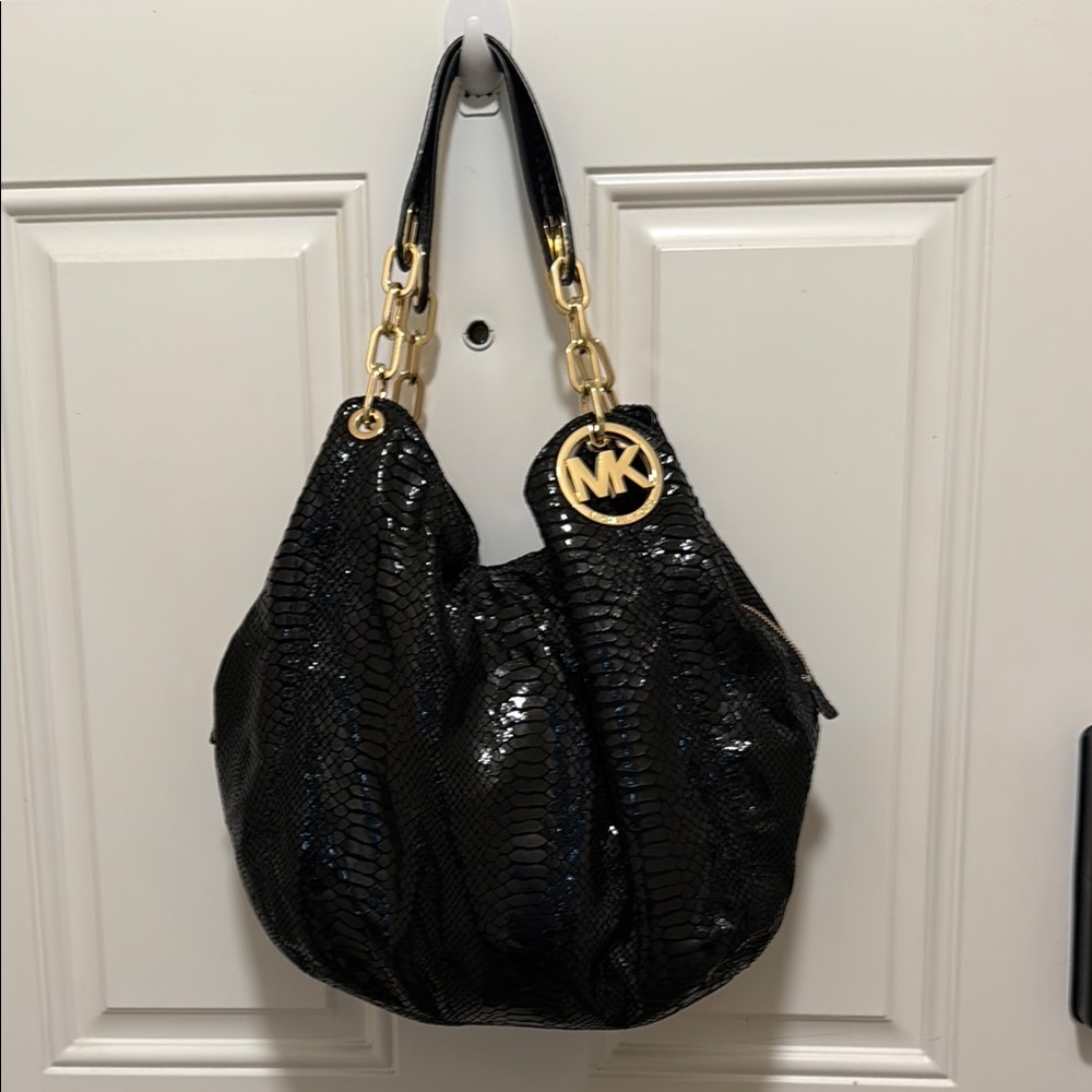 Michael Kors Shiny Black Hobo Bag with Gold Accents